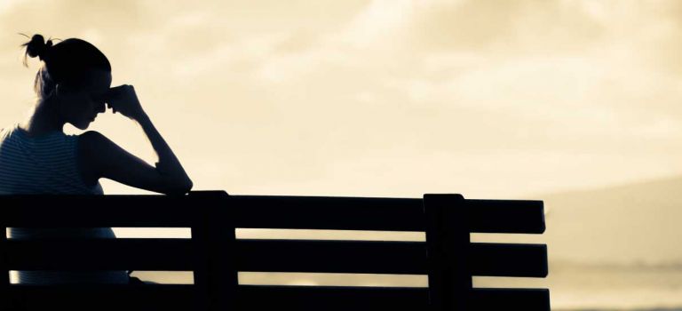 Woman sitting on bench