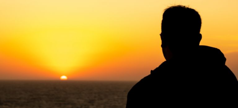 Man looking out to sea