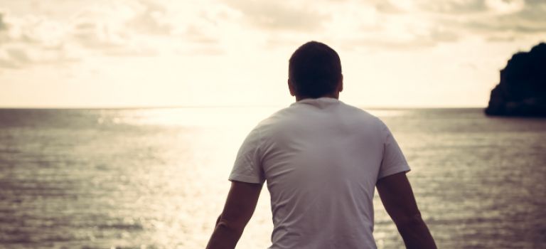 Man looking out to sea