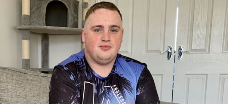 Aidan Spence in his home after M9 car crash caused by bonnet not being closed by Kwik Fit