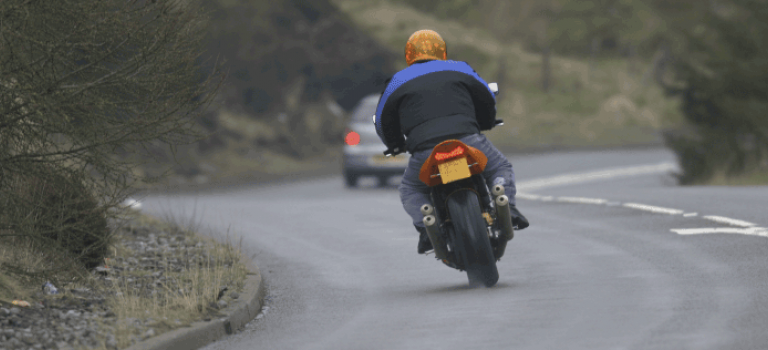 Motorcycle on Country Road in Scotland