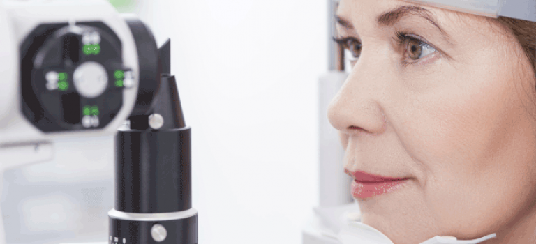 Woman getting eyes examined