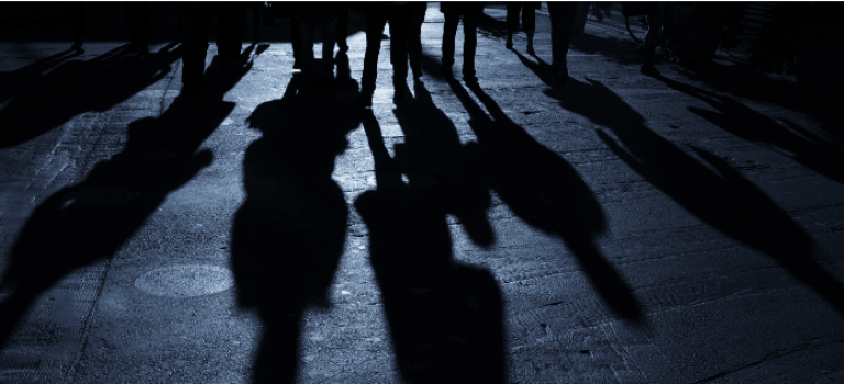 Criminal assault group walking at night