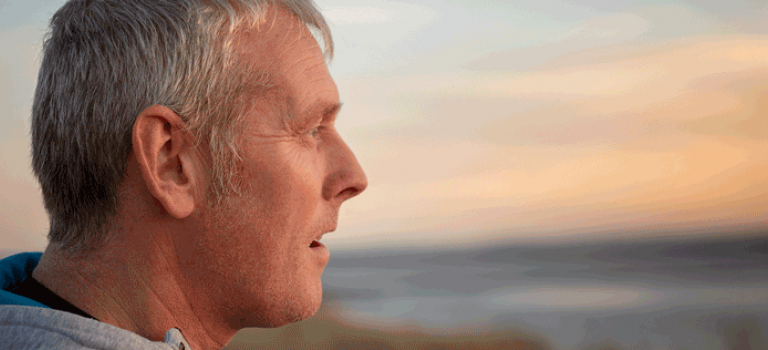 Man looking out to sea
